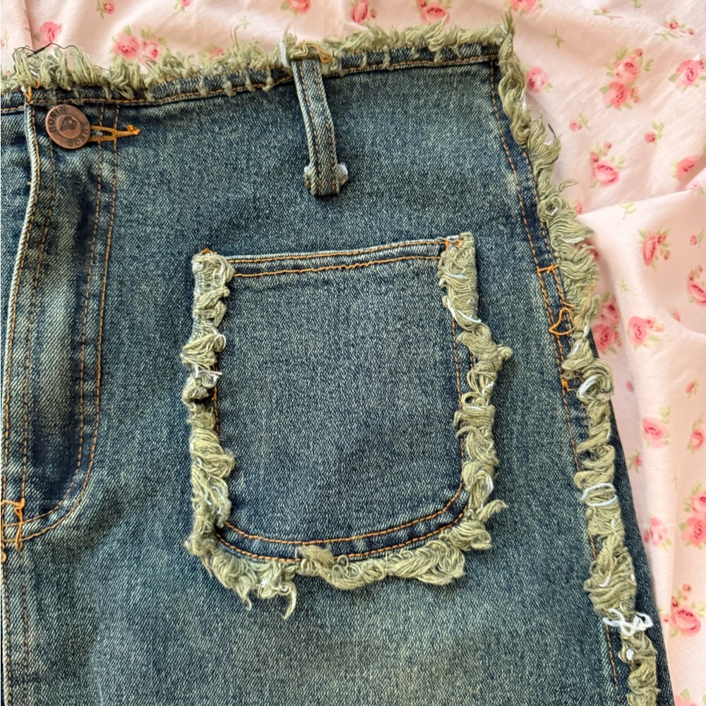 Vintage distressed denim skirt